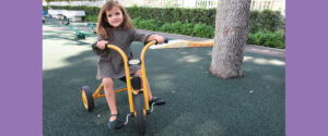 Little Girl on Bike at Toddler Daycare in Pinecrest, FL, South Miami, Coconut Grove, Coral Gables