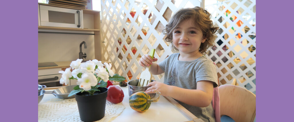 Girl Smiling/Playing at a Daycare in Pinecrest, FL, South Miami, Coconut Grove, and Coral Gables