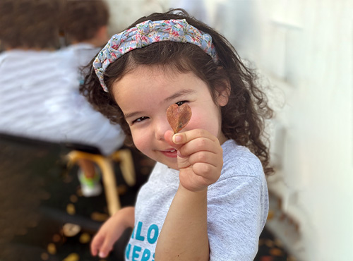 girl holding leaf-careers