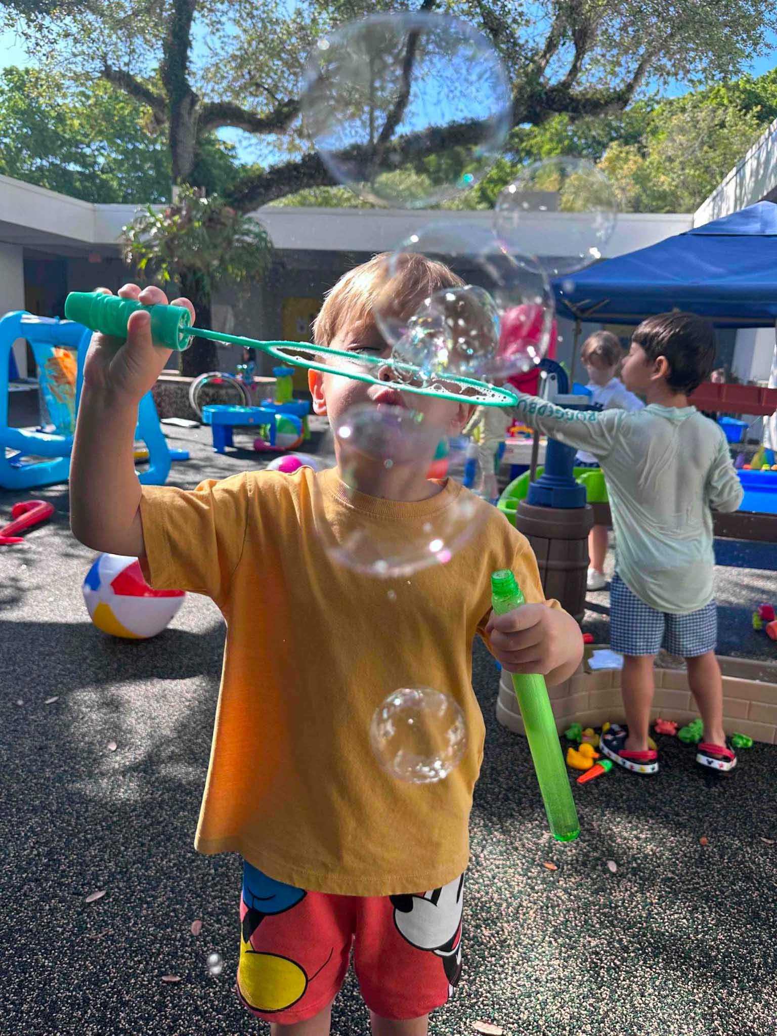 blowing bubbles at summer camp